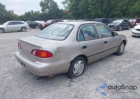 1999 Toyota Corolla Ce from USA, damaged, VIN 2T1BR12E3XC246635